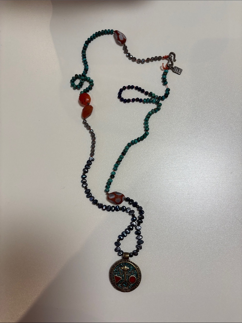 And not a gemstone necklace
